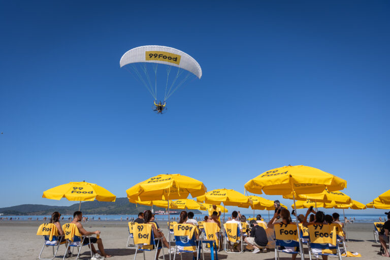 99Food invade Santos por céu, terra e mar em campanha de lançamento